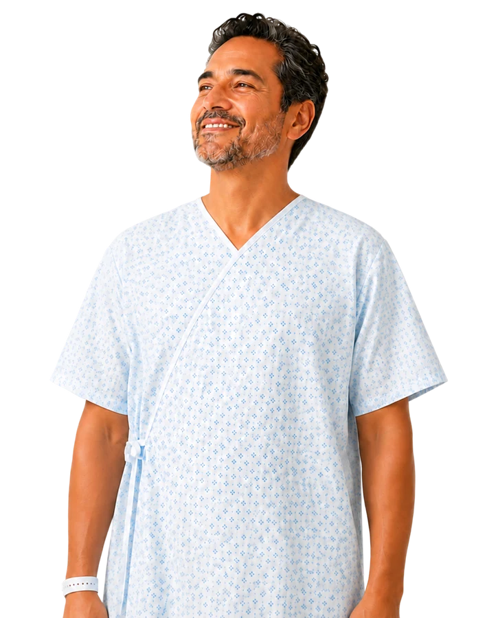 A smiling patient in a hospital gown